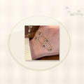 Elegant Floral Hand Chain for Women Made of Brass with Zircon Inlay, Minimalist Luxury Style Bracelet for Daily Wear and Office Use styled ecommerce image for women