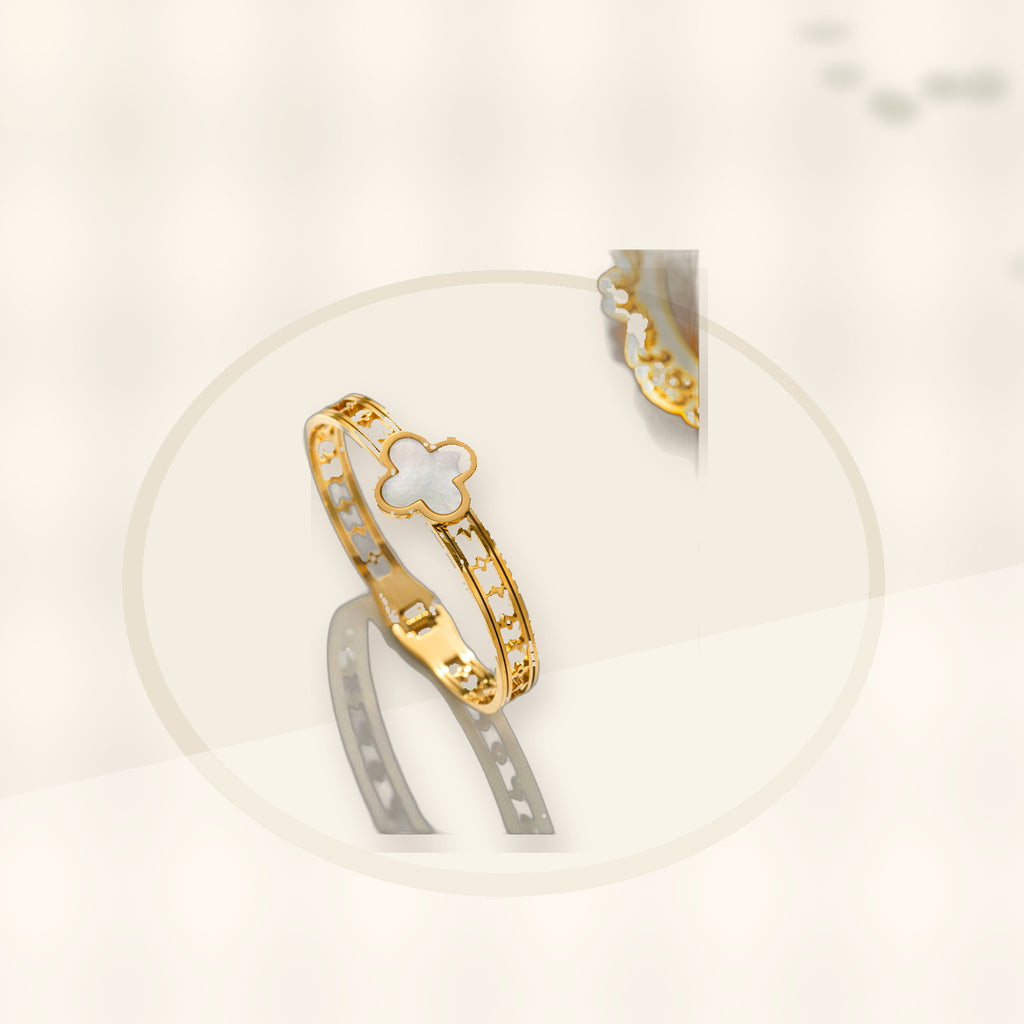 Minimalist Lucky Clover Shaped Titanium Steel Bracelet with Vacuum Plating for Women styled ecommerce image for women