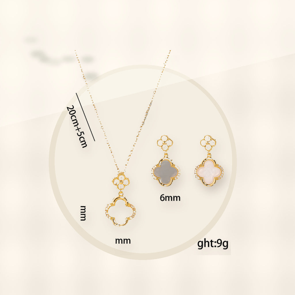 Luxury Style Clover-Shaped Titanium Steel Necklace and Earrings Set with Micro-Pavé Setting for Women and Men styled ecommerce image for women