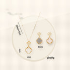 Luxury Style Clover-Shaped Titanium Steel Necklace and Earrings Set with Micro-Pavé Setting for Women and Men styled ecommerce image for women