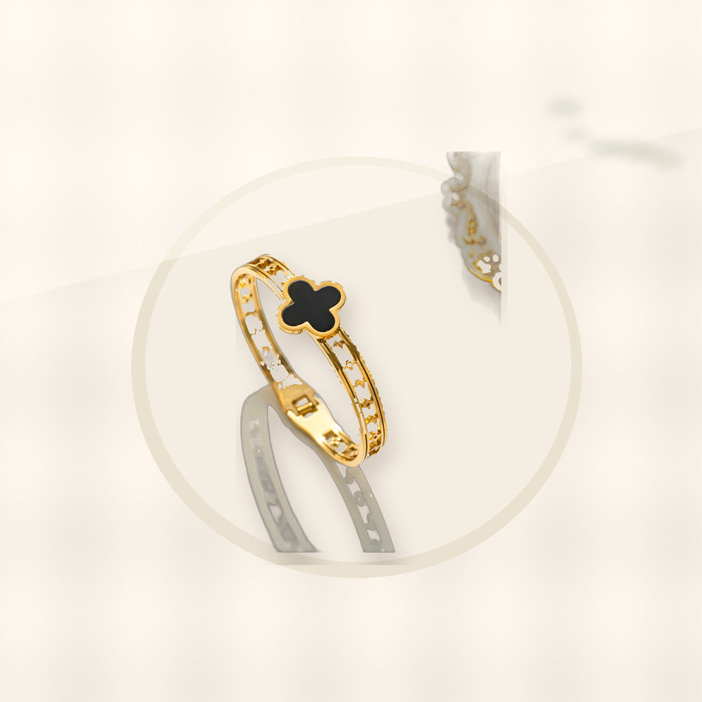 Minimalist Lucky Clover Shaped Titanium Steel Bracelet with Vacuum Plating for Women styled ecommerce image for women