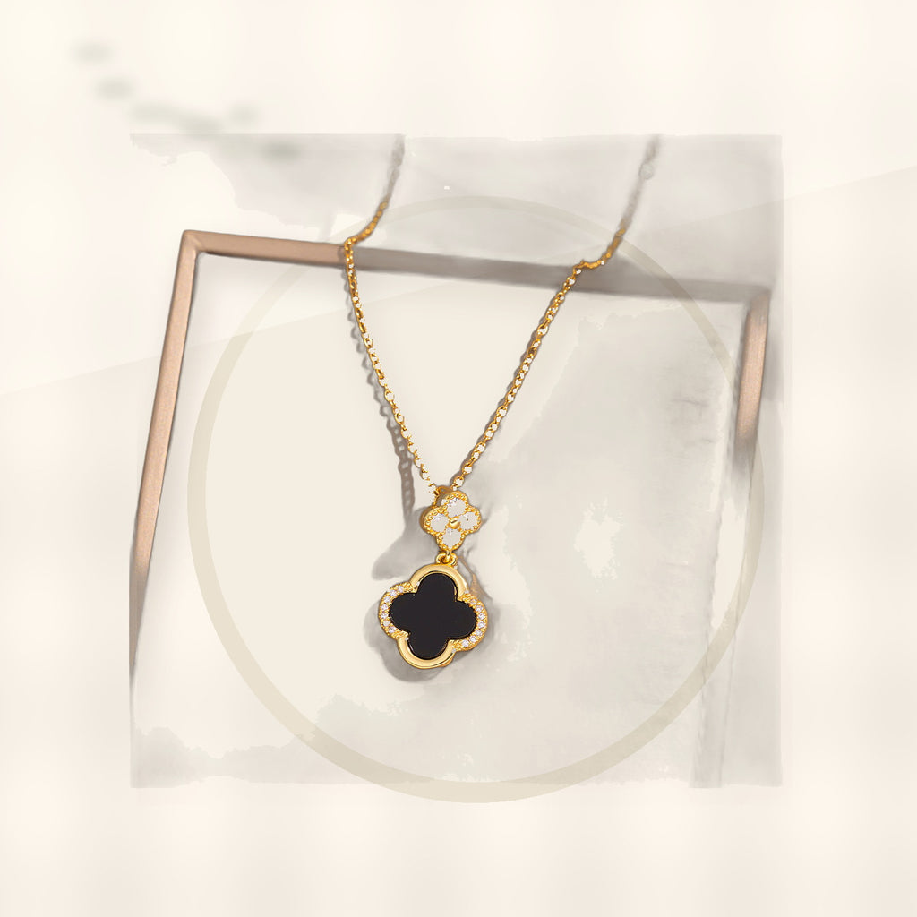 Luxury Style Clover-Shaped Titanium Steel Necklace and Earrings Set with Micro-Pavé Setting for Women and Men styled ecommerce image for women