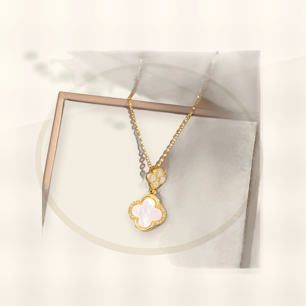 Luxury Style Clover-Shaped Titanium Steel Necklace and Earrings Set with Micro-Pavé Setting for Women and Men styled ecommerce image for women