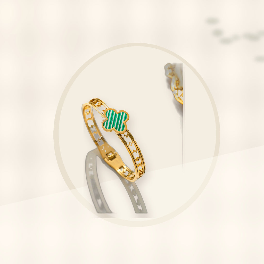 Minimalist Lucky Clover Shaped Titanium Steel Bracelet with Vacuum Plating for Women styled ecommerce image for women