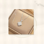Minimalist Four-Leaf Clover Pendant Necklace for Women in Titanium Steel with Rhinestone Inlay and Polished Finish styled ecommerce image for women