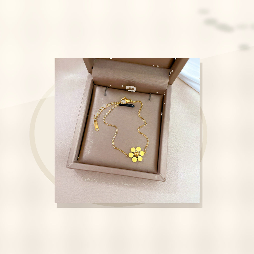 Vintage Style Six-Petal Flower Beaded Bracelet for Women Made of Titanium Steel with Gold Inlay and Wavy Texture styled ecommerce image for women