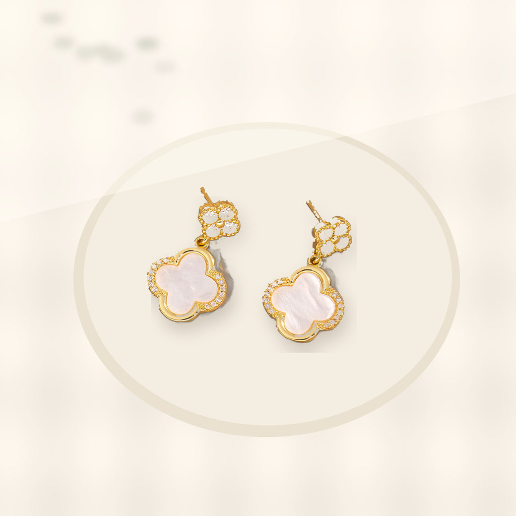 Luxury Style Clover-Shaped Titanium Steel Necklace and Earrings Set with Micro-Pavé Setting for Women and Men styled ecommerce image for women
