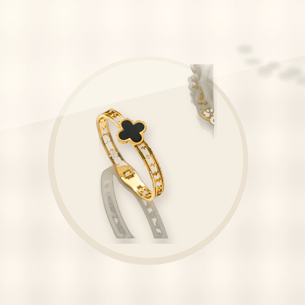 Minimalist Lucky Clover Shaped Titanium Steel Bracelet with Vacuum Plating for Women styled ecommerce image for women