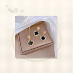 Luxury Style Clover-Shaped Titanium Steel Necklace and Earrings Set with Micro-Pavé Setting for Women and Men styled ecommerce image for women