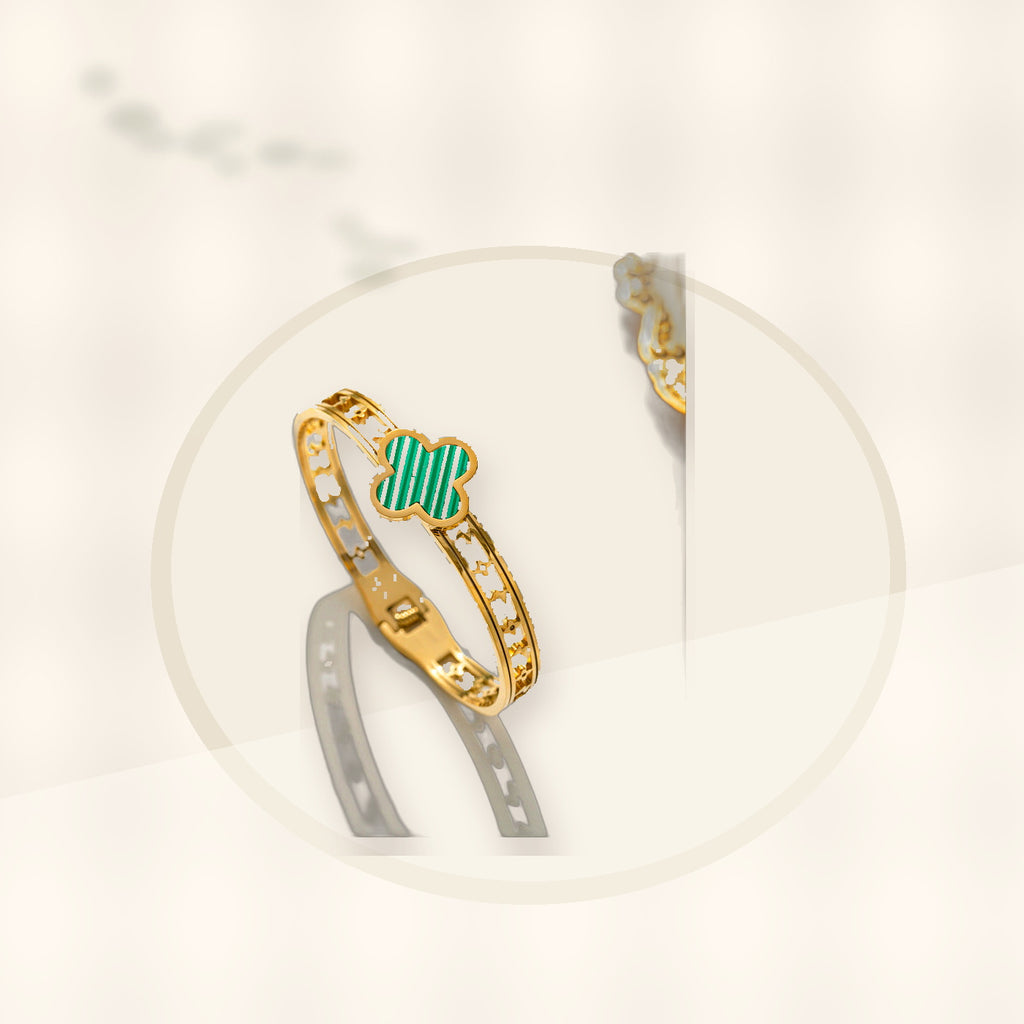 Minimalist Lucky Clover Shaped Titanium Steel Bracelet with Vacuum Plating for Women styled ecommerce image for women