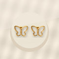 Elegant French Style Gold Electroplated 316L Stainless Steel Butterfly Stud Earrings for Women with Natural White Shell - ivory marble minimal luxury product photo