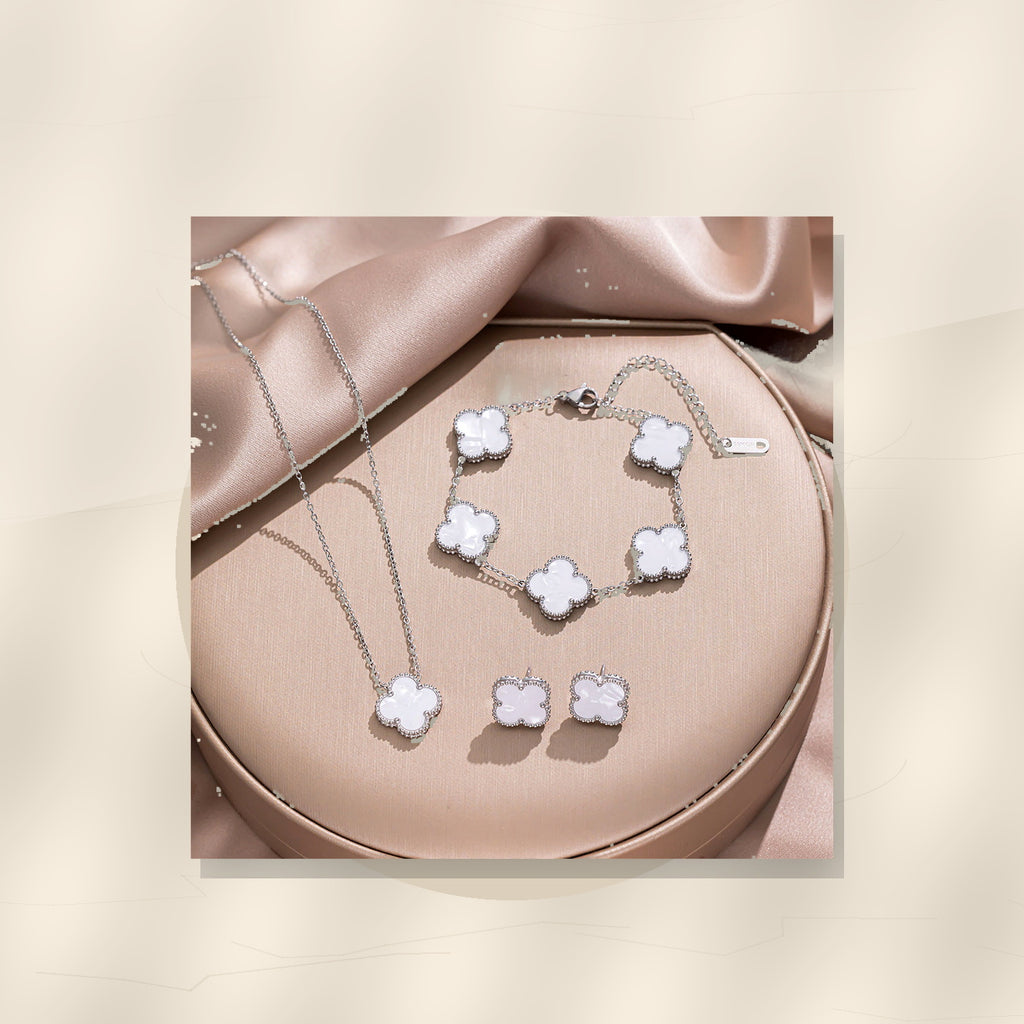 Minimalist Clover-Shaped 316L 316L Stainless Steel Necklace Set with Matching Bracelet and Earrings for Women - ivory marble minimal luxury product photo