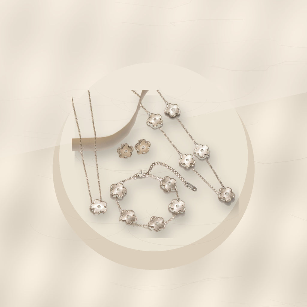 Minimalist Five-Petal Flower Necklace Set in 316L 316L Stainless Steel with Laser-Cut Clover Design, Gold Electroplated finish, O-Chain, for Women - ivory marble minimal luxury product photo