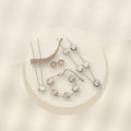 Minimalist Five-Petal Flower Necklace Set in 316L 316L Stainless Steel with Laser-Cut Clover Design, Gold Electroplated finish, O-Chain, for Women - ivory marble minimal luxury product photo