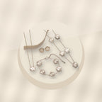 Minimalist Five-Petal Flower Necklace Set in 316L 316L Stainless Steel with Laser-Cut Clover Design, Gold Electroplated finish, O-Chain, for Women - ivory marble minimal luxury product photo
