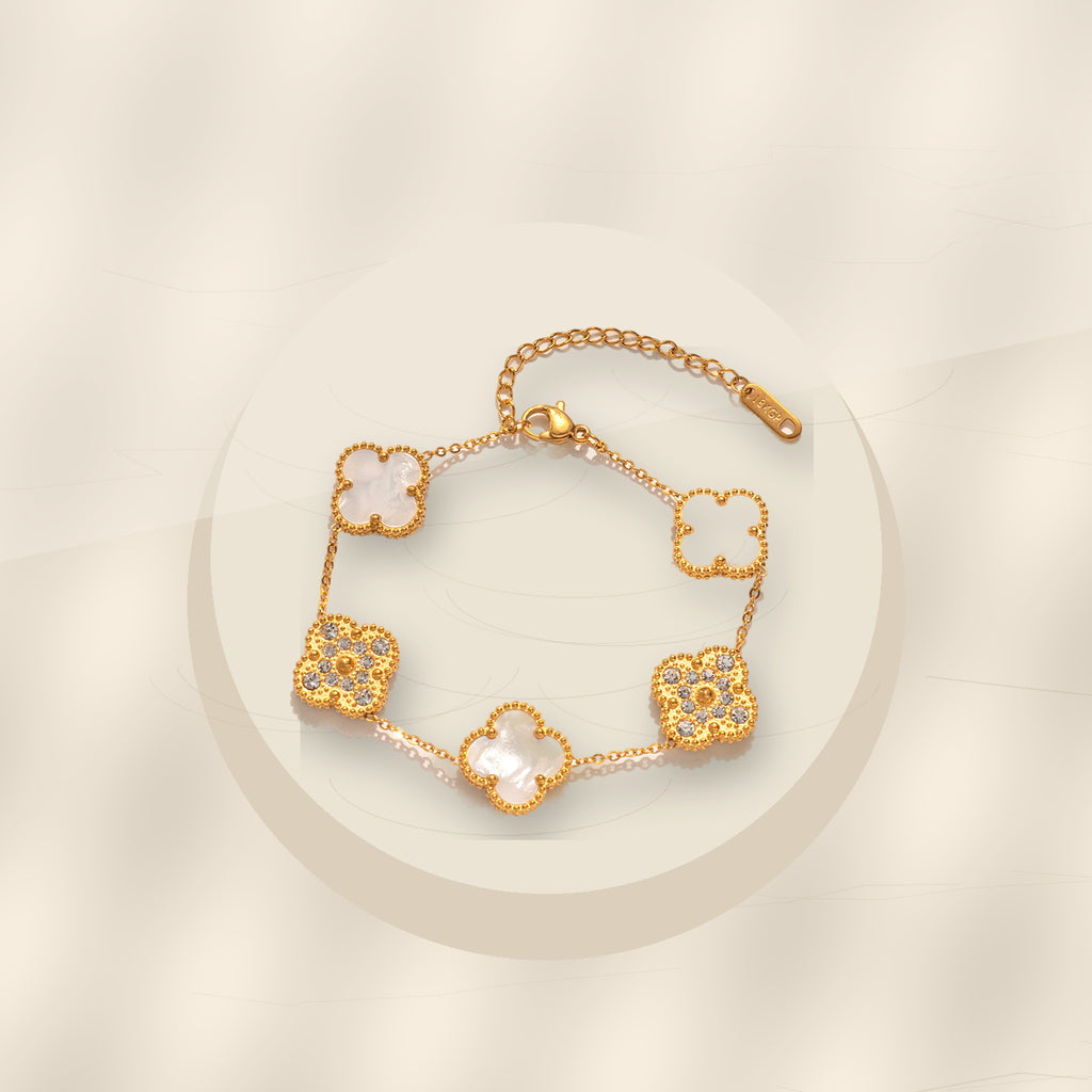 Elegant Four-Leaf Clover Bracelet in 316L 316L Stainless Steel with Rhinestone Inlay, Dual-Wear Design for Women and Men, Electroplated for Hypoallergenic Wear - ivory marble minimal luxury product photo