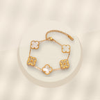 Elegant Four-Leaf Clover Bracelet in 316L 316L Stainless Steel with Rhinestone Inlay, Dual-Wear Design for Women and Men, Electroplated for Hypoallergenic Wear - ivory marble minimal luxury product photo