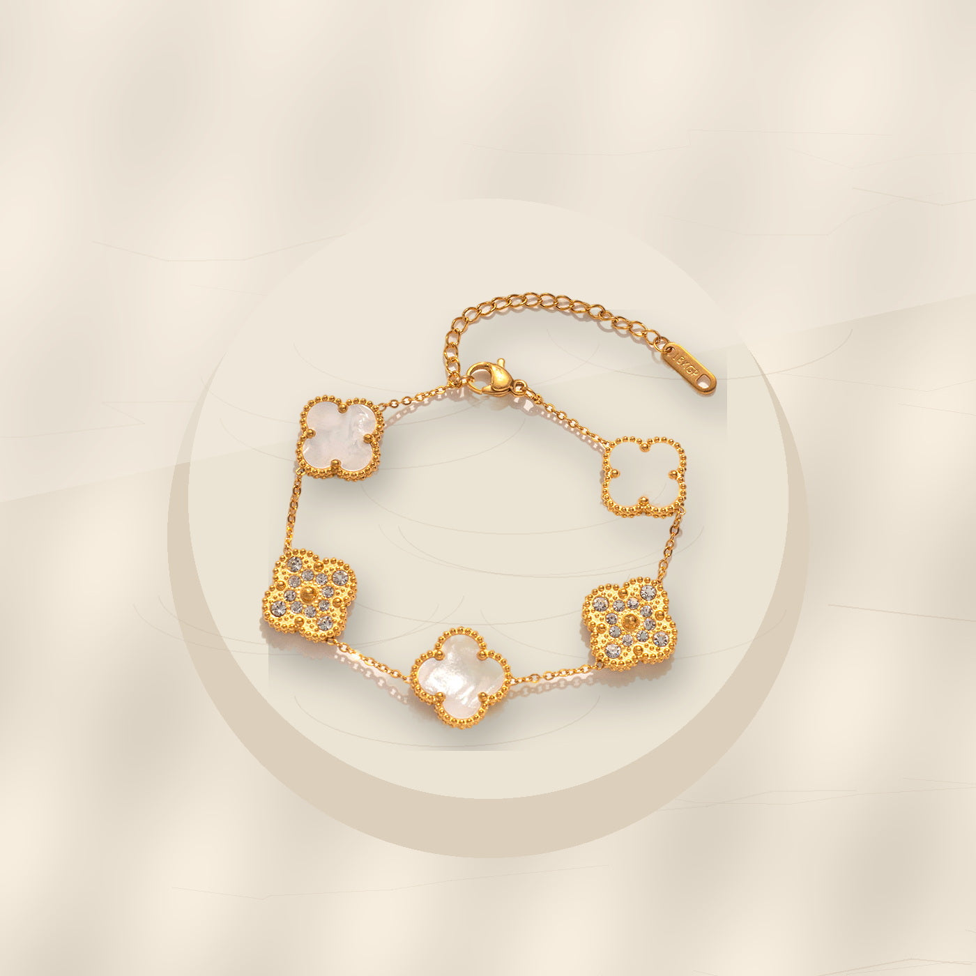 Elegant Four-Leaf Clover Bracelet in 316L 316L Stainless Steel with Rhinestone Inlay, Dual-Wear Design for Women and Men, Electroplated for Hypoallergenic Wear - ivory marble minimal luxury product photo