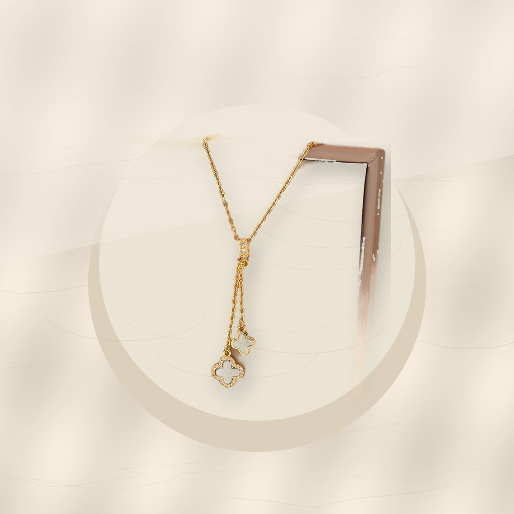 Minimalist Four-Leaf Clover Pendant Necklace for Women and Men in 316L 316L Stainless Steel with Micro-Pave 316L Stainless Steel Inlay and Plated Finish on O-Chain - ivory marble minimal luxury product photo