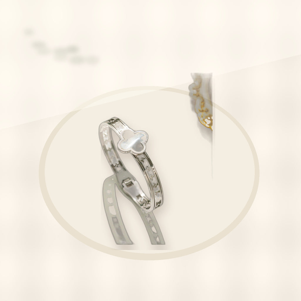 Minimalist Lucky Clover Shaped Titanium Steel Bracelet with Vacuum Plating for Women styled ecommerce image for women