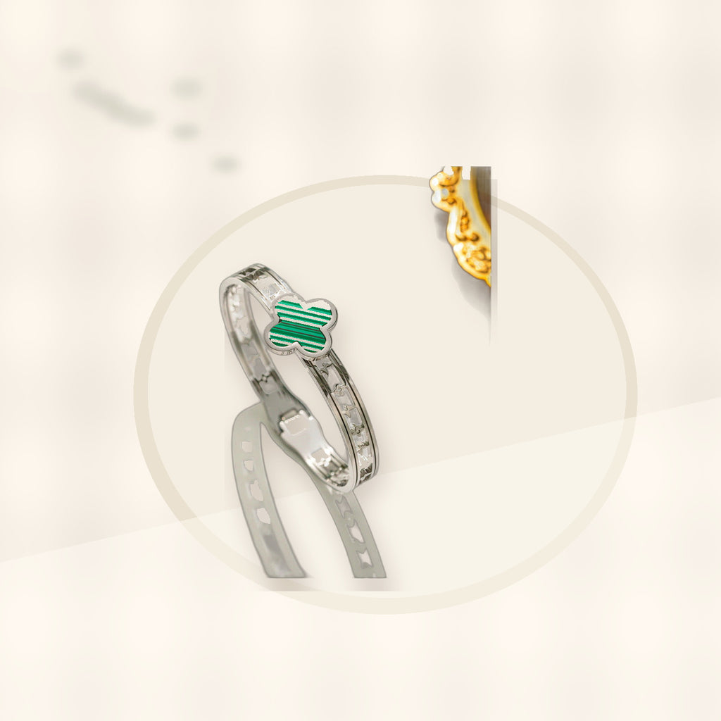 Minimalist Lucky Clover Shaped Titanium Steel Bracelet with Vacuum Plating for Women styled ecommerce image for women