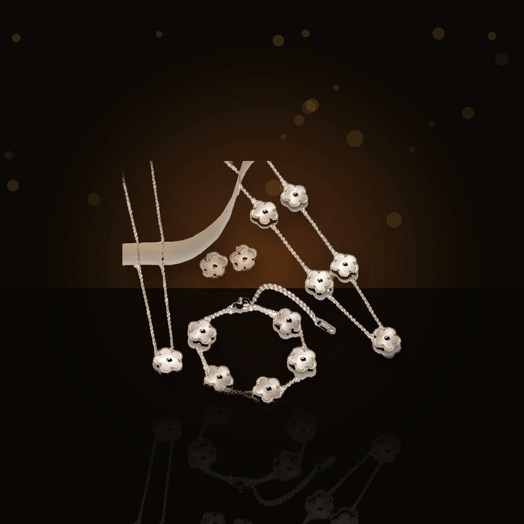 Minimalist Five-Petal Flower Necklace Set in 316L 316L Stainless Steel with Laser-Cut Clover Design, Gold Electroplated finish, O-Chain, for Women - dark glossy luxury campaign product photo