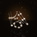 Minimalist Five-Petal Flower Necklace Set in 316L 316L Stainless Steel with Laser-Cut Clover Design, Gold Electroplated finish, O-Chain, for Women - dark glossy luxury campaign product photo