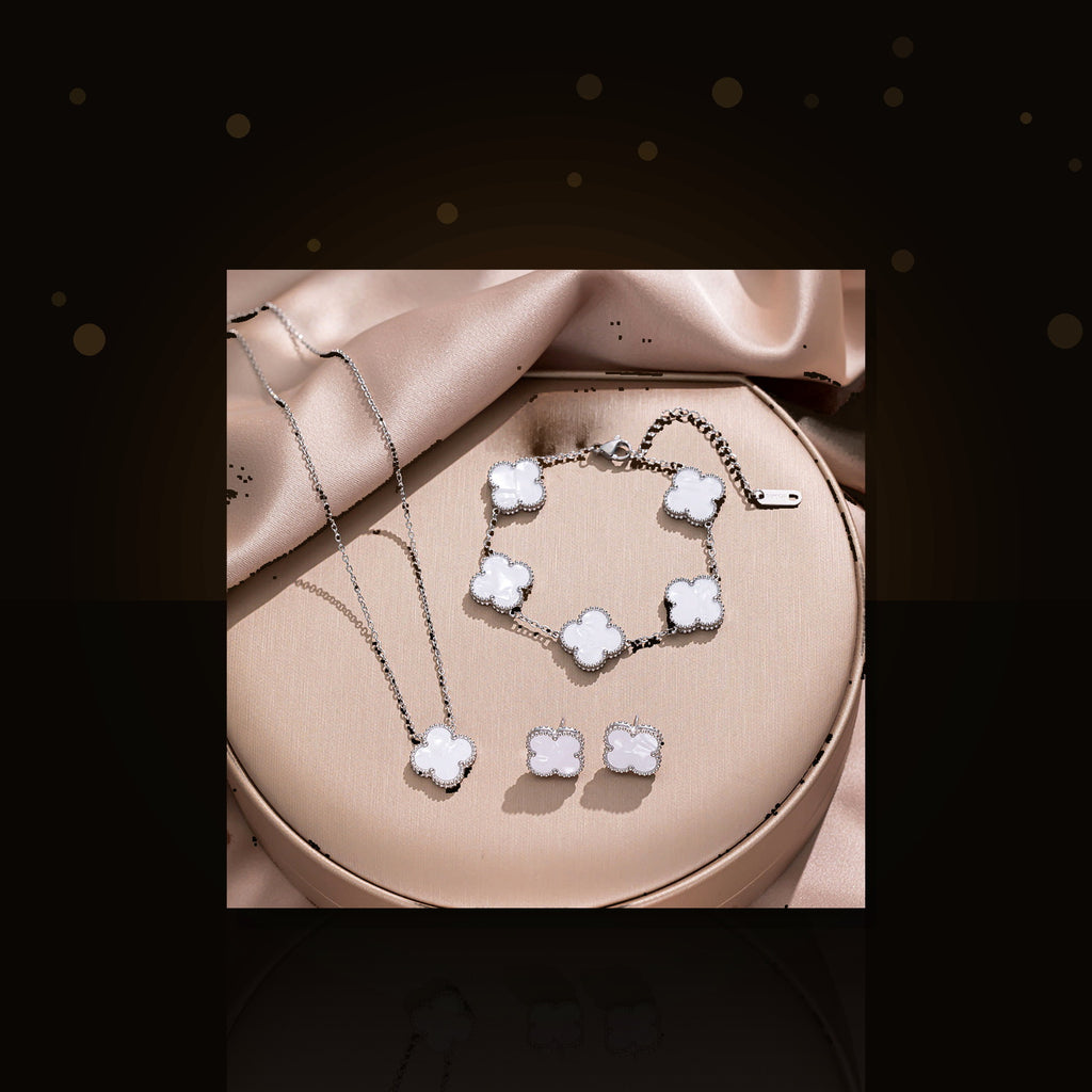 Minimalist Clover-Shaped 316L 316L Stainless Steel Necklace Set with Matching Bracelet and Earrings for Women - dark glossy luxury campaign product photo