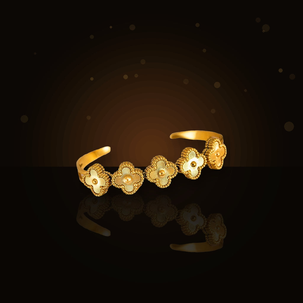Minimalist Elegant 316L 316L Stainless Steel Bracelet for Women with Gold Electroplated finish and Geometric Oval Design - dark glossy luxury campaign product photo