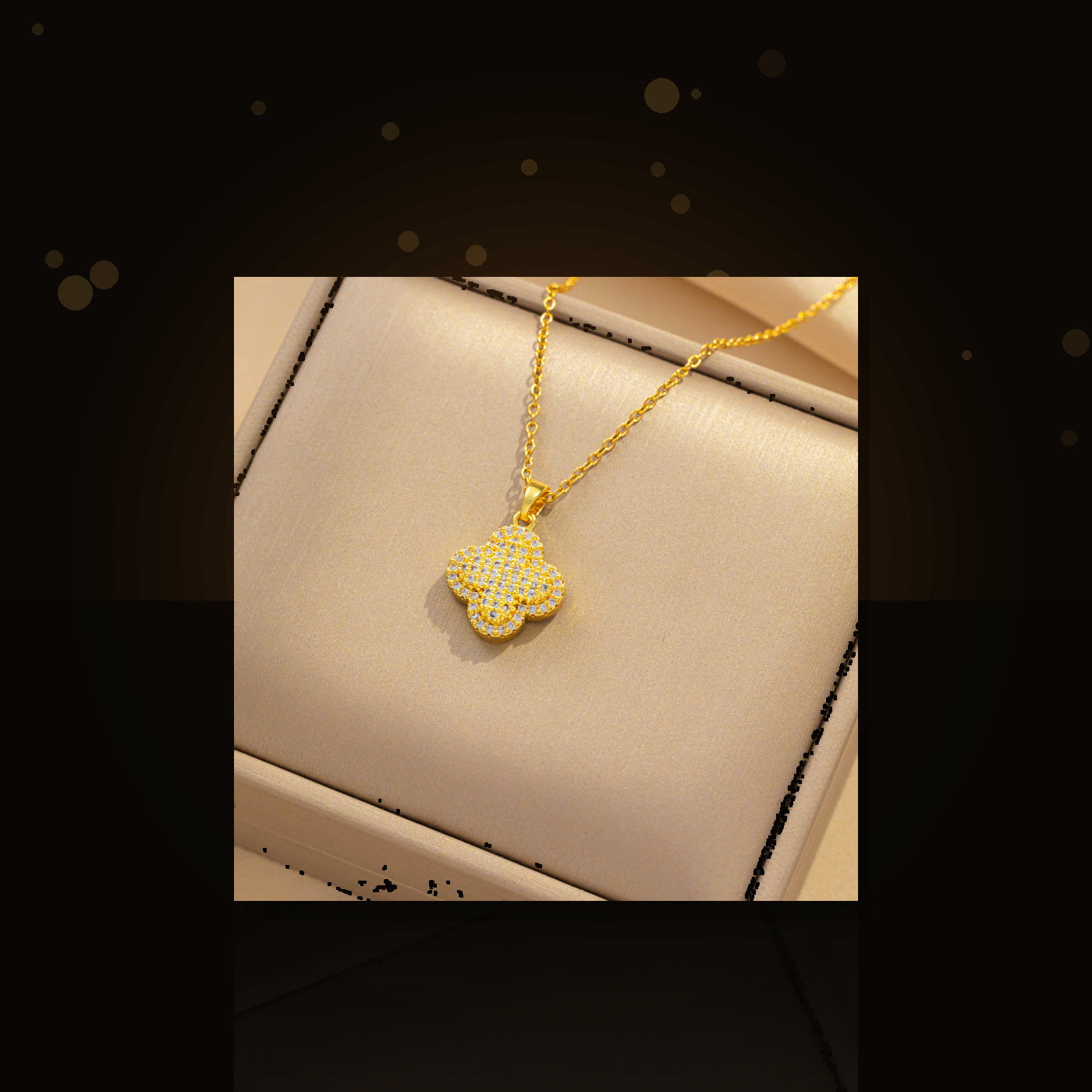 Minimalist Four-Leaf Clover Pendant Necklace for Women in 316L 316L Stainless Steel with Rhinestone Inlay and Polished Finish - dark glossy luxury campaign product photo