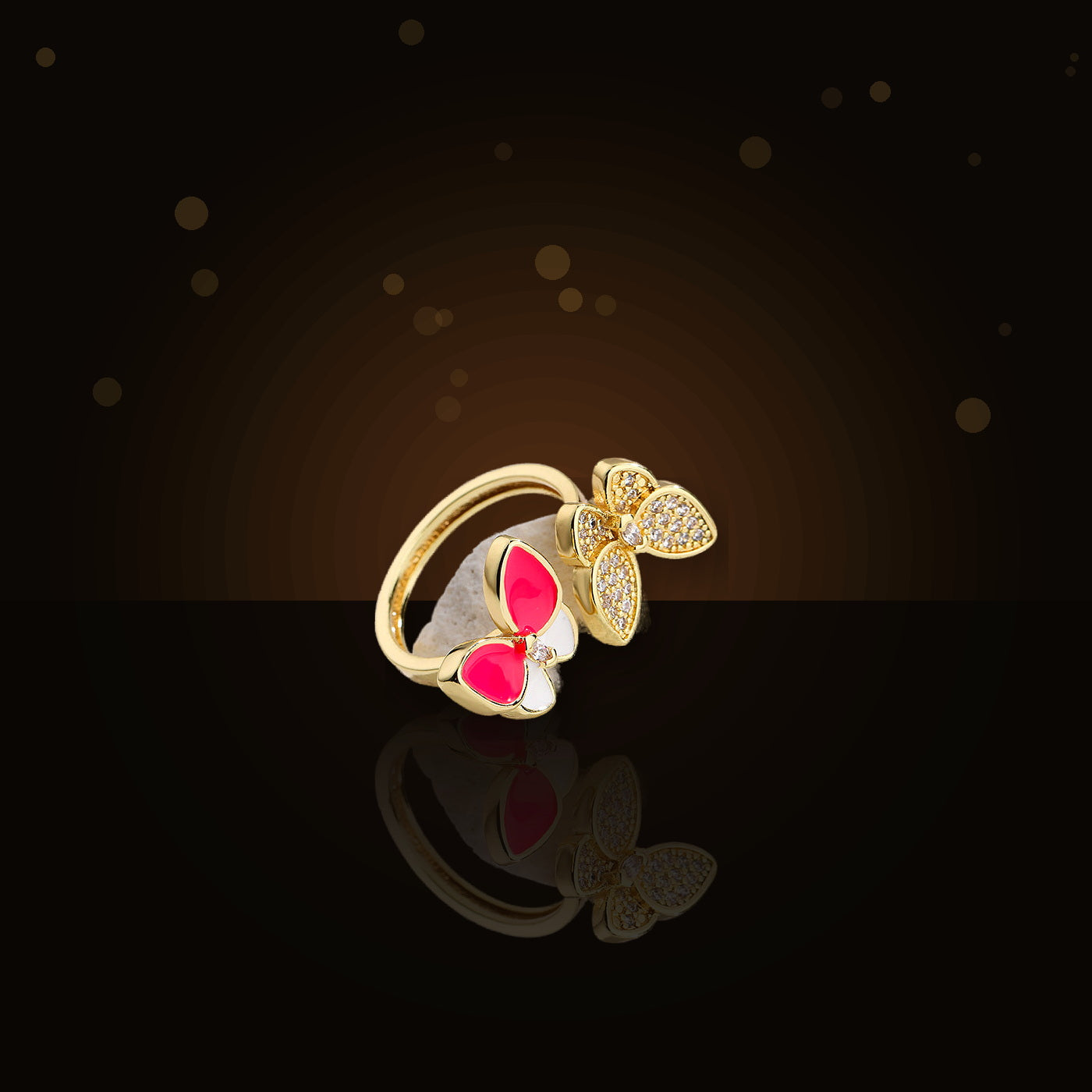 Butterfly-Shaped Minimalist 316L Stainless Steel Ring with Gold Electroplated and Micro-Pave Zirconia Accents for Women - dark glossy luxury campaign product photo