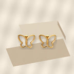 Elegant French Style Gold Electroplated 316L Stainless Steel Butterfly Stud Earrings for Women with Natural White Shell - modern geometric editorial product photo