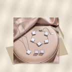 Minimalist Clover-Shaped 316L 316L Stainless Steel Necklace Set with Matching Bracelet and Earrings for Women - modern geometric editorial product photo